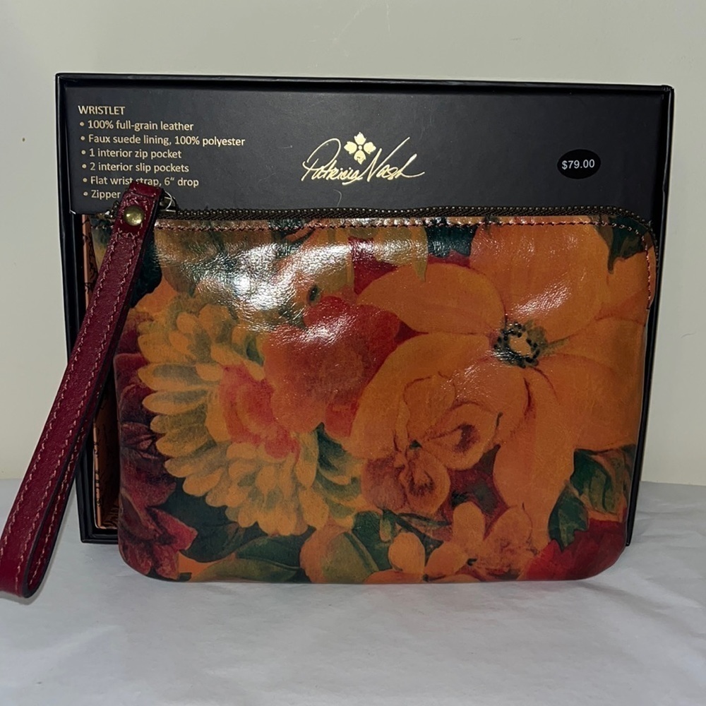 Patricia Nash leather wristlet with faux suede lining, new